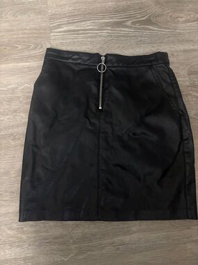 bebe Black Faux Leather Mini Skirt with Front Ring Zip